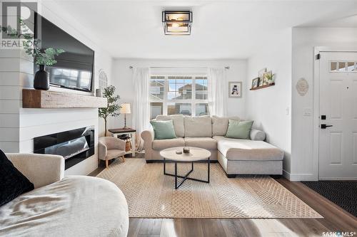 734 Kolynchuk Court, Saskatoon, SK - Indoor Photo Showing Living Room With Fireplace