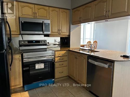 1702 - 4080 Living Arts Drive, Mississauga, ON - Indoor Photo Showing Kitchen With Double Sink