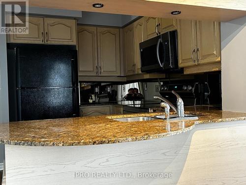 1702 - 4080 Living Arts Drive, Mississauga, ON - Indoor Photo Showing Kitchen With Double Sink