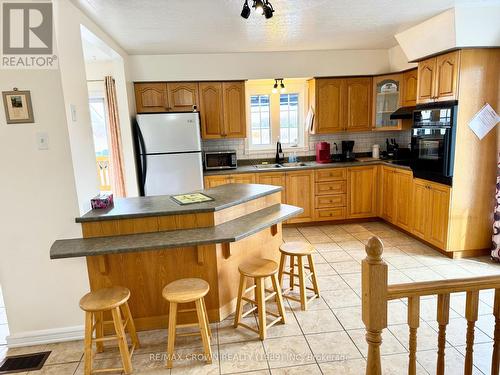 919 Highway 11, Fauquier-Strickland, ON - Indoor Photo Showing Kitchen With Double Sink