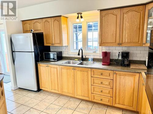 919 Highway 11, Fauquier-Strickland, ON - Indoor Photo Showing Kitchen With Double Sink