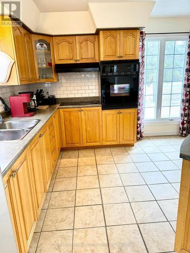 919 Highway 11, Fauquier-Strickland, ON - Indoor Photo Showing Kitchen With Double Sink