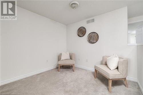 Living area featuring light carpet - 169 Bismark Drive Unit# 32, Cambridge, ON - Indoor Photo Showing Other Room