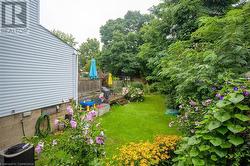 View of yard with cooling unit and a deck - 