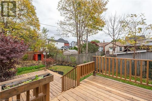 Deck featuring an outbuilding - 19 Strachan Street E, Hamilton, ON 