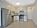 313-2486 Old Bronte Rd, Oakville, ON  - Indoor Photo Showing Kitchen With Stainless Steel Kitchen 