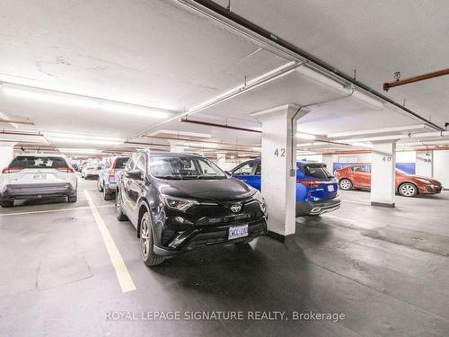 106-1001 Cedarglen Gate, Mississauga, ON - Indoor Photo Showing Garage