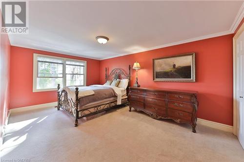 Bedroom featuring light carpet and crown molding - 218 Northshore Boulevard W, Burlington, ON 