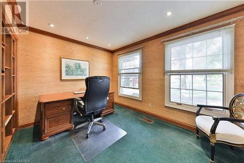 Home office featuring crown molding and dark carpet - 218 Northshore Boulevard W, Burlington, ON 