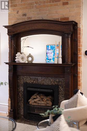 111 Cowan Avenue, Toronto, ON - Indoor Photo Showing Living Room With Fireplace