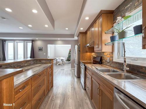 130049 29 Avenue N, Hartney, MB - Indoor Photo Showing Kitchen With Double Sink