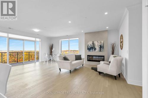 913 - 480 Callaway Road, London, ON - Indoor Photo Showing Living Room With Fireplace