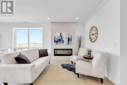 913 - 480 Callaway Road, London, ON - Indoor Photo Showing Living Room With Fireplace