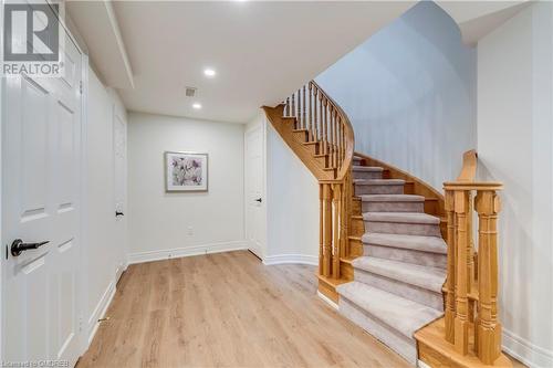 Stairs with hardwood / wood-style flooring - 2303 Hill Ridge Court Unit# 10, Oakville, ON 