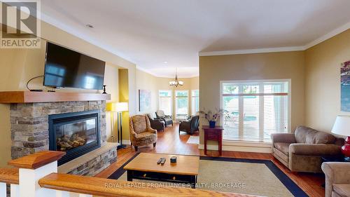 8-2 - 532 10Th Concession Road, Rideau Lakes, ON - Indoor Photo Showing Living Room With Fireplace