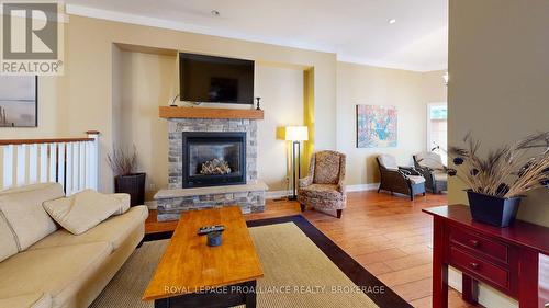 8-2 - 532 10Th Concession Road, Rideau Lakes, ON - Indoor Photo Showing Living Room With Fireplace