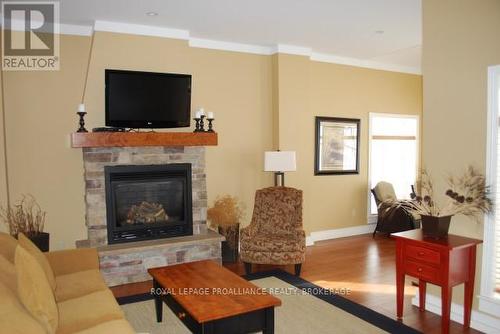 8-2 - 532 10Th Concession Road, Westport, ON - Indoor Photo Showing Living Room With Fireplace