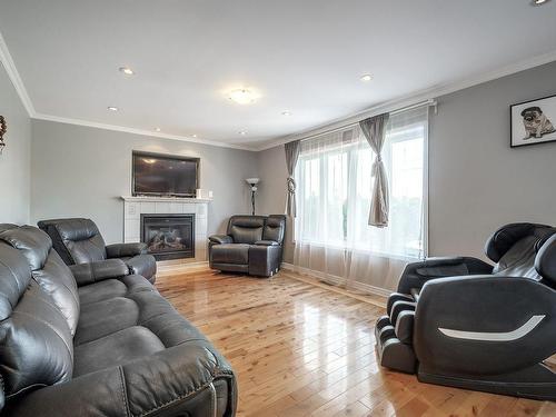 Family room - 84 Rue Jean-Paul-Lemieux, Notre-Dame-De-L'Île-Perrot, QC - Indoor Photo Showing Living Room With Fireplace