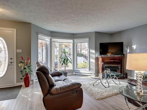 Salon - 1100 Rue Paul-Desruisseaux, Sherbrooke (Les Nations), QC - Indoor Photo Showing Living Room With Fireplace