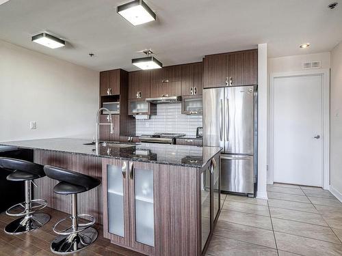 Cuisine - 301-2875 Av. Du Cosmodôme, Laval (Chomedey), QC - Indoor Photo Showing Kitchen With Upgraded Kitchen