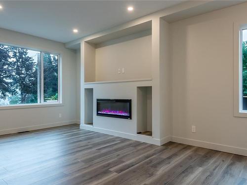 B-4080 Discovery Dr, Campbell River, BC - Indoor Photo Showing Other Room With Fireplace