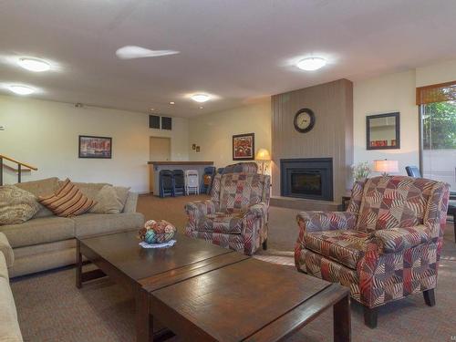 209-79 Gorge Rd West, Saanich, BC - Indoor Photo Showing Living Room With Fireplace