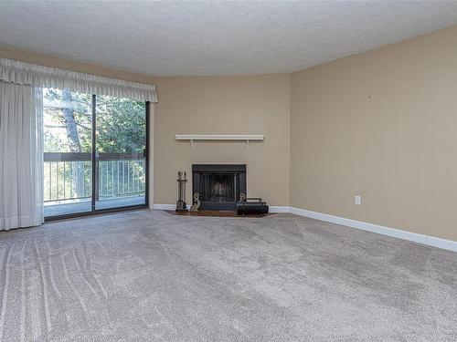 209-79 Gorge Rd West, Saanich, BC - Indoor Photo Showing Living Room With Fireplace