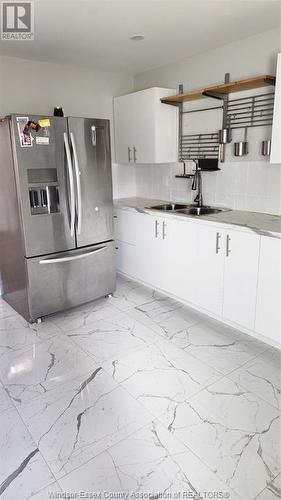 25 Noble Court Unit# Lower, Amherstburg, ON - Indoor Photo Showing Kitchen With Double Sink