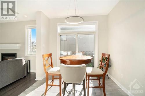 603 Capuchon Way, Ottawa, ON - Indoor Photo Showing Dining Room With Fireplace