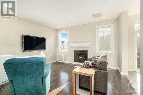 603 Capuchon Way, Ottawa, ON - Indoor Photo Showing Living Room With Fireplace