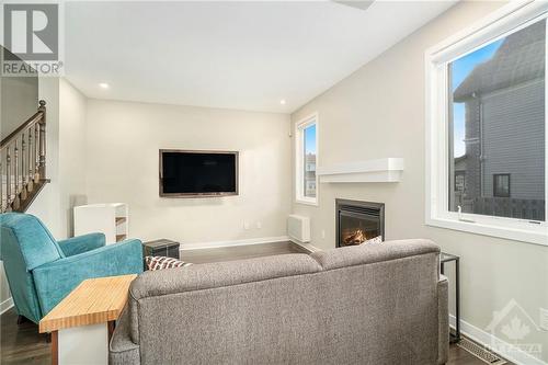 603 Capuchon Way, Ottawa, ON - Indoor Photo Showing Living Room With Fireplace