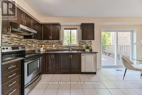 209 Queen Mary Drive, Brampton, ON - Indoor Photo Showing Kitchen With Stainless Steel Kitchen With Double Sink