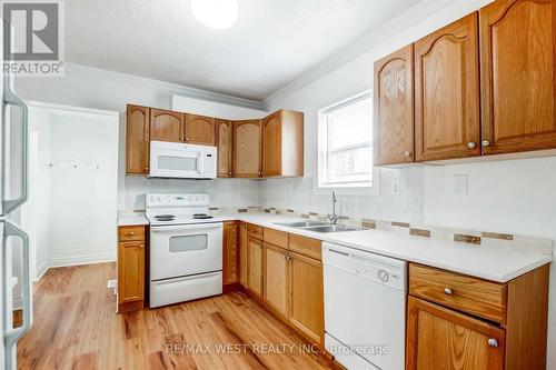 Upper - 14 Fitzgerald Street, St. Catharines, ON - Indoor Photo Showing Kitchen With Double Sink