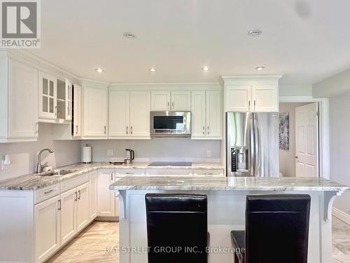 5173 Rice Lake Drive N, Hamilton Township, ON - Indoor Photo Showing Kitchen With Stainless Steel Kitchen With Double Sink With Upgraded Kitchen