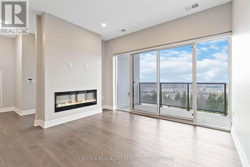 706 - 1880 Gordon Street, Guelph, ON - Indoor Photo Showing Other Room With Fireplace