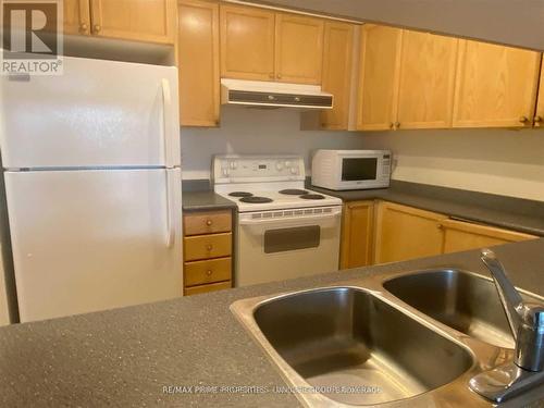 507 - 887 Bay Street, Toronto, ON - Indoor Photo Showing Kitchen With Double Sink