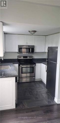 64 - 42 Pinery Trail, Toronto, ON - Indoor Photo Showing Kitchen