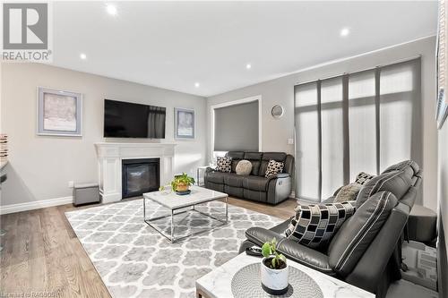 Living room with light wood-type flooring - 466 Normanton Street, Port Elgin, ON - Indoor Photo Showing Living Room With Fireplace