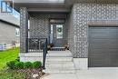 View of exterior entry featuring a garage - 466 Normanton Street, Port Elgin, ON  - Outdoor 