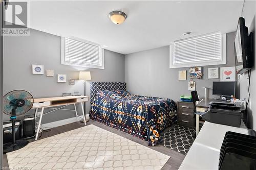 Bedroom featuring dark wood-type flooring - 466 Normanton Street, Port Elgin, ON - Indoor Photo Showing Bedroom