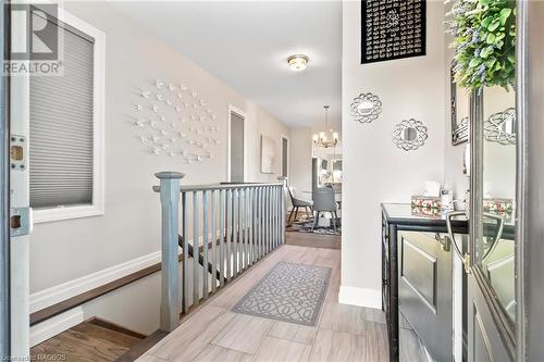 Hallway with a notable chandelier and light hardwood / wood-style flooring - 466 Normanton Street, Port Elgin, ON - Indoor Photo Showing Other Room