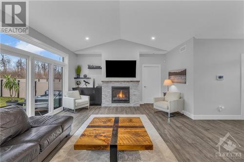 1077 Shearer Drive, Brockville, ON - Indoor Photo Showing Living Room With Fireplace