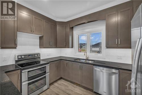 1077 Shearer Drive, Brockville, ON - Indoor Photo Showing Kitchen With Double Sink