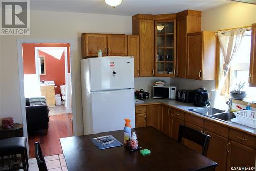 3 2Nd Avenue, Weyburn, SK - Indoor Photo Showing Kitchen With Double Sink