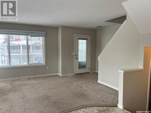 32 4533 Delhaye Way, Regina, SK - Indoor Photo Showing Other Room