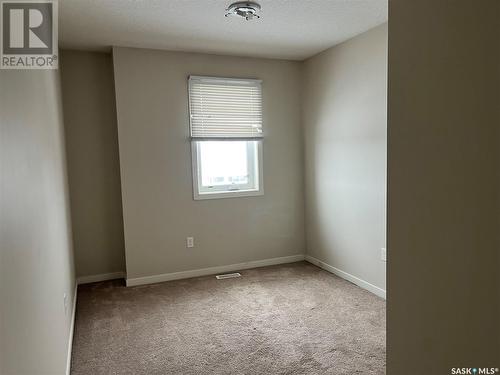 32 4533 Delhaye Way, Regina, SK - Indoor Photo Showing Other Room