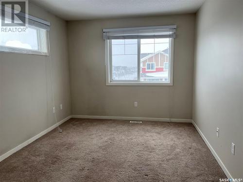 32 4533 Delhaye Way, Regina, SK - Indoor Photo Showing Other Room