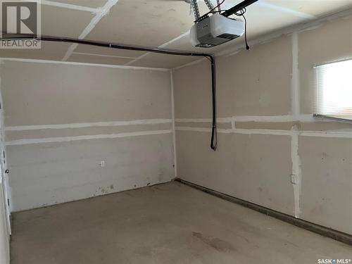 32 4533 Delhaye Way, Regina, SK - Indoor Photo Showing Garage