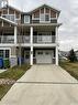 32 4533 Delhaye Way, Regina, SK  - Outdoor With Facade 