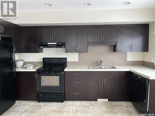 32 4533 Delhaye Way, Regina, SK - Indoor Photo Showing Kitchen With Double Sink